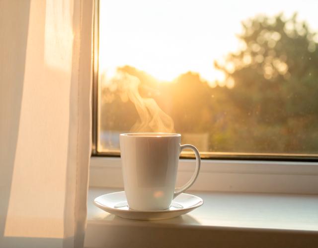 Morning coffee near a window, a calm start without cigarettes